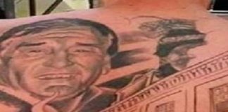 Tatuaggio volto medico che lo ha salvato